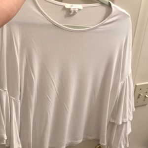 White blouse with ruffled sleeves